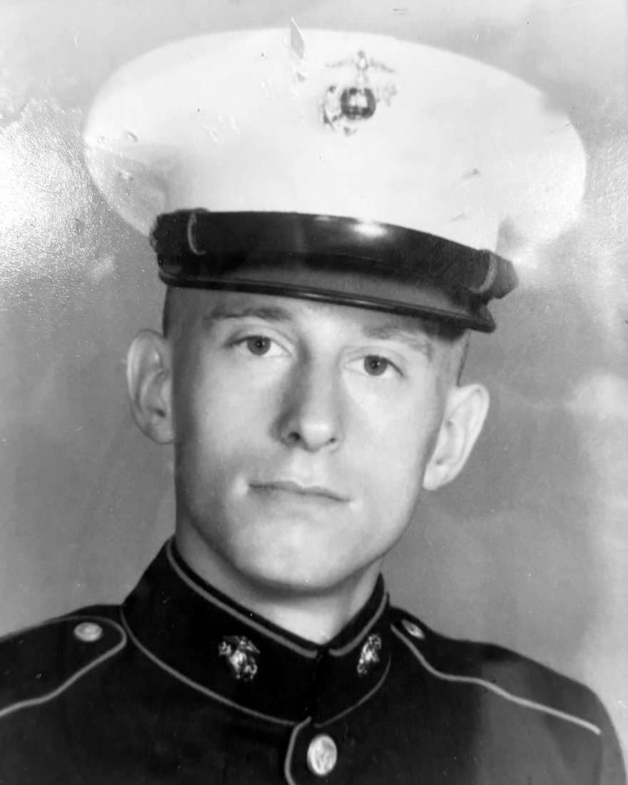 Private First Class George J. Mack in Marine Corps dress blues, from the portrait that hangs in the Post hall.